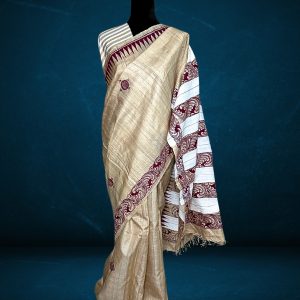 unique patachitra silk saree on raw tussar with white body and maroon art from Odisha artisans