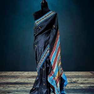 black silk saree with blue border and anchal by Nuapatna weavers